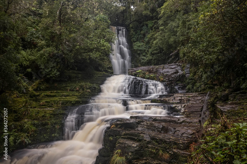 Fototapeta Naklejka Na Ścianę i Meble -  Long exposure of McLean Falls, deep in the countryside of Southern New Zealand. 