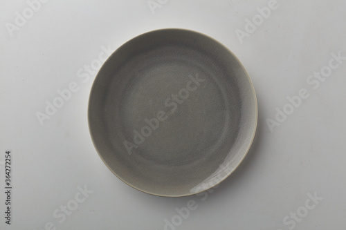 Top view shot of a plate on white background