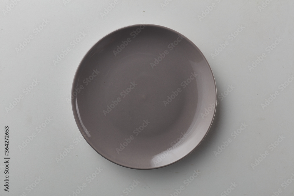 Top view shot of a plate on white background Top view shot of a plate on white background