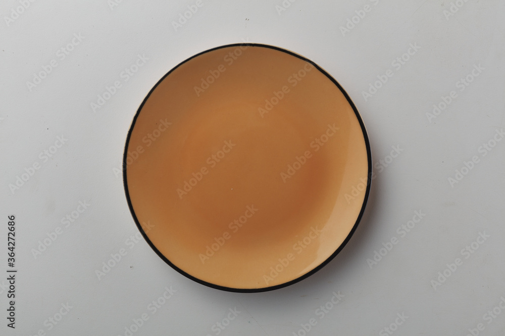 Top view shot of a plate on white background Top view shot of a plate on white background