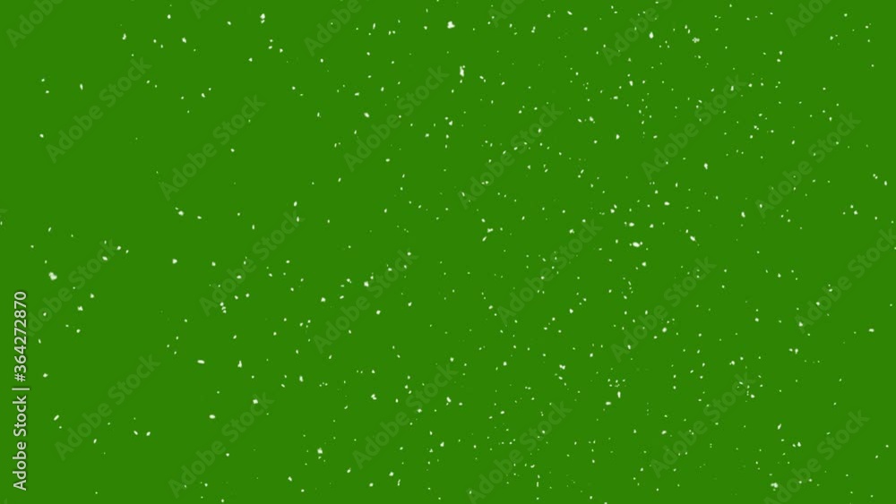 Snow falling on green background Snow falling on green background