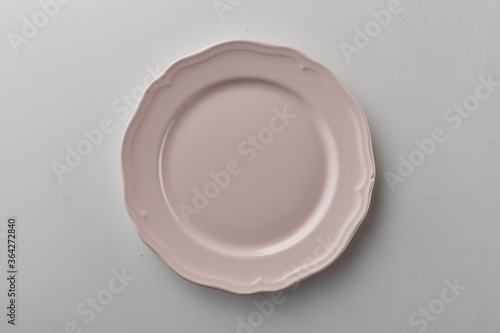 Top view shot of a plate on white background.