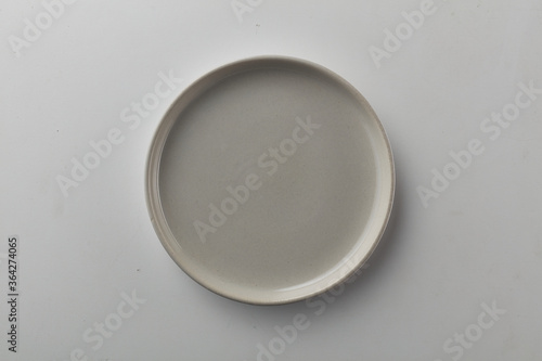 Top view shot of a plate on white background.