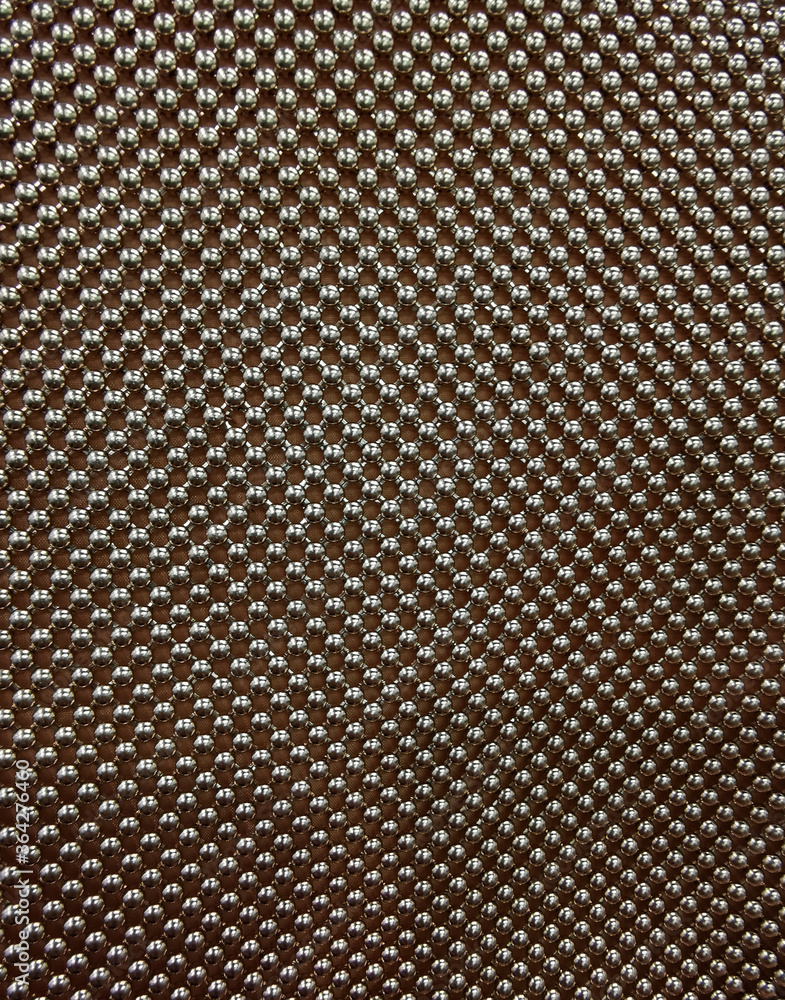 metal balls on a dark background abstract texture, selective focus, noise, blurred background metal balls on a dark background abstract texture, selective focus, noise, blurred background