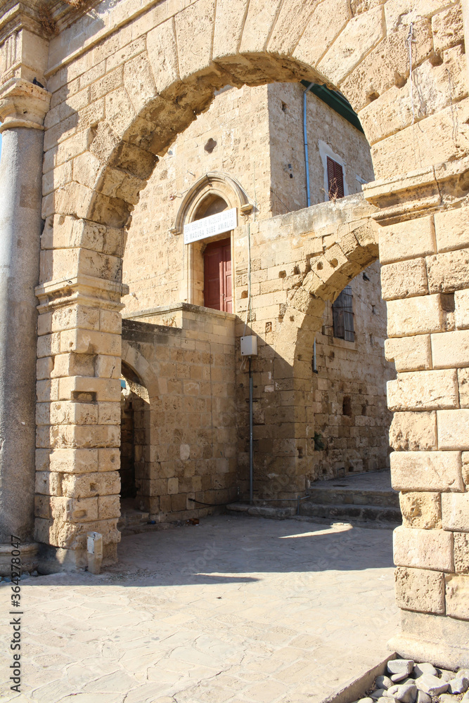 Ancient stone arches with columns on Famagusta street. Cyprus.