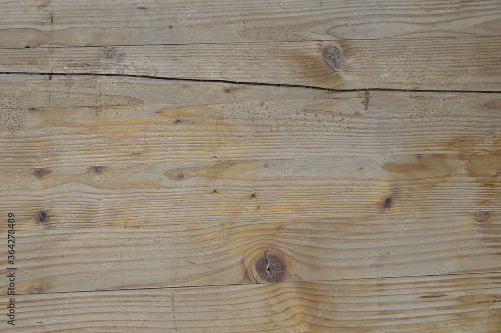 Fototapeta premium sfondo legno, tavola rovinata, con taglio e nodi, striature reali non uniformi