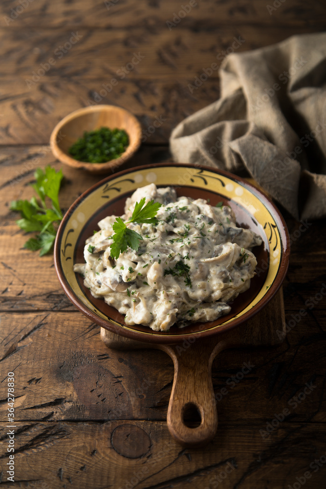 Homemade mushroom stew with cream and parsley Homemade mushroom stew with cream and parsley