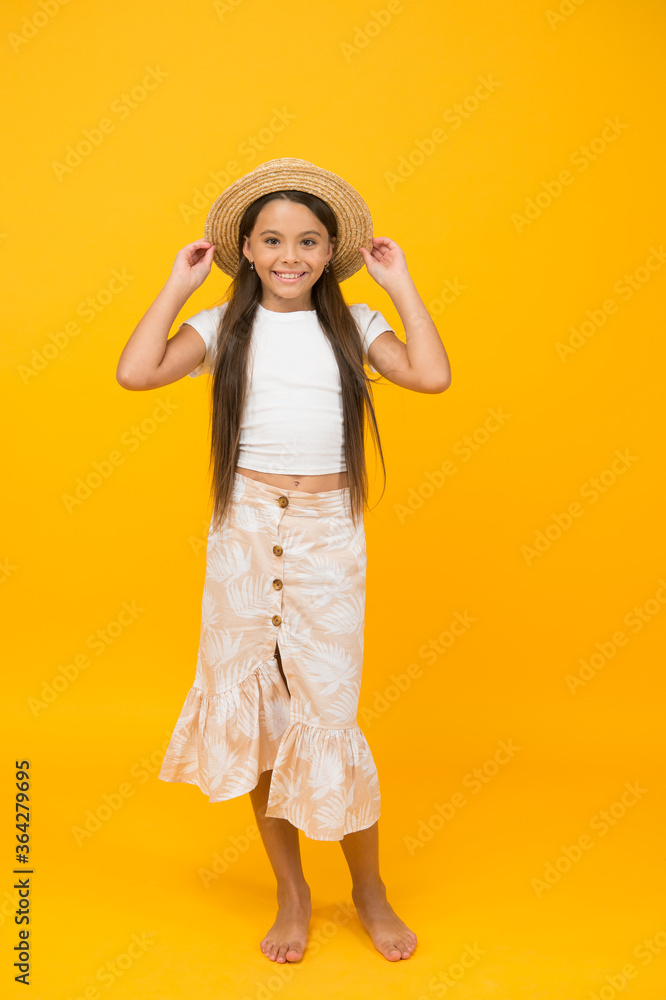 her personal style. she love summer holiday. its vacation time. feel happy and carefree. smiling cutie in straw hat. happy childhood concept. small girl has long healthy hair. kid beauty and fashion her personal style. she love summer holiday. its vacation time. feel happy and carefree. smiling cutie in straw hat. happy childhood concept. small girl has long healthy hair. kid beauty and fashion