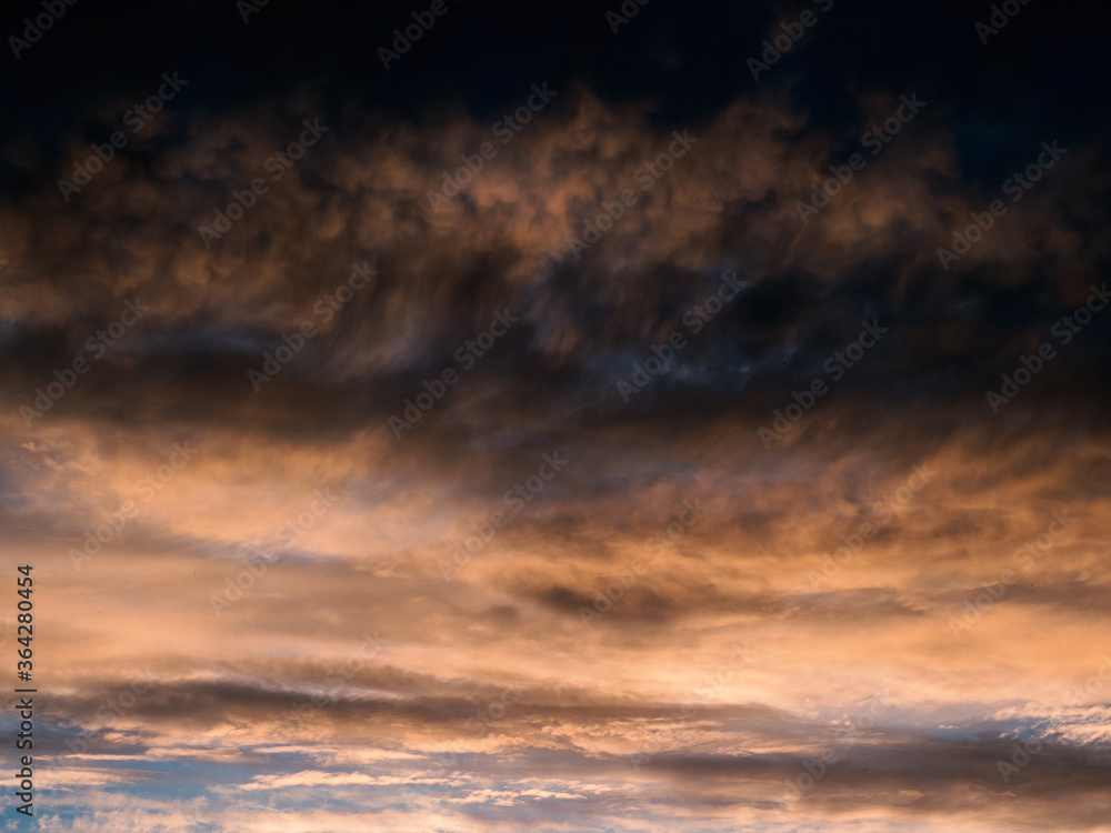 Dark gradient of the evening sky. Colorful cloudy sky at sunset. Sky texture, abstract nature background