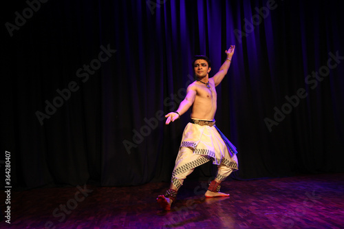 A graceful bharatnatyam dancer

 photo