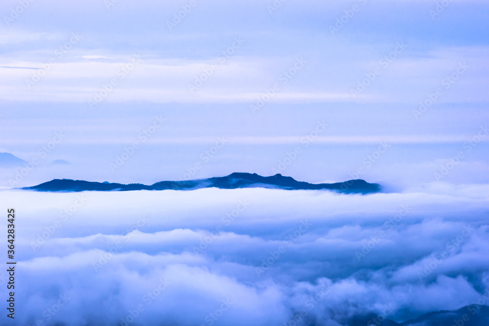 Beautiful sea of clouds at dawn on the top of the mountain.