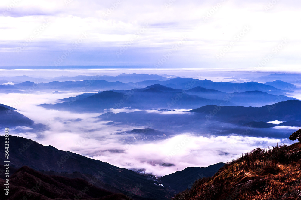 Beautiful sea of clouds at dawn on the top of the mountain.
