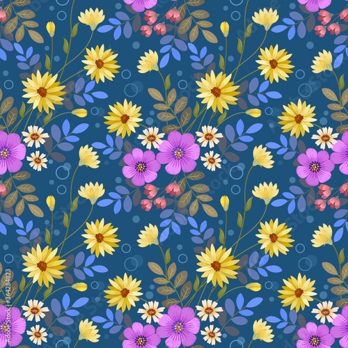 Colorful flowers on blue background seamless pattern for fabric textile wallpaper. © teerawat
