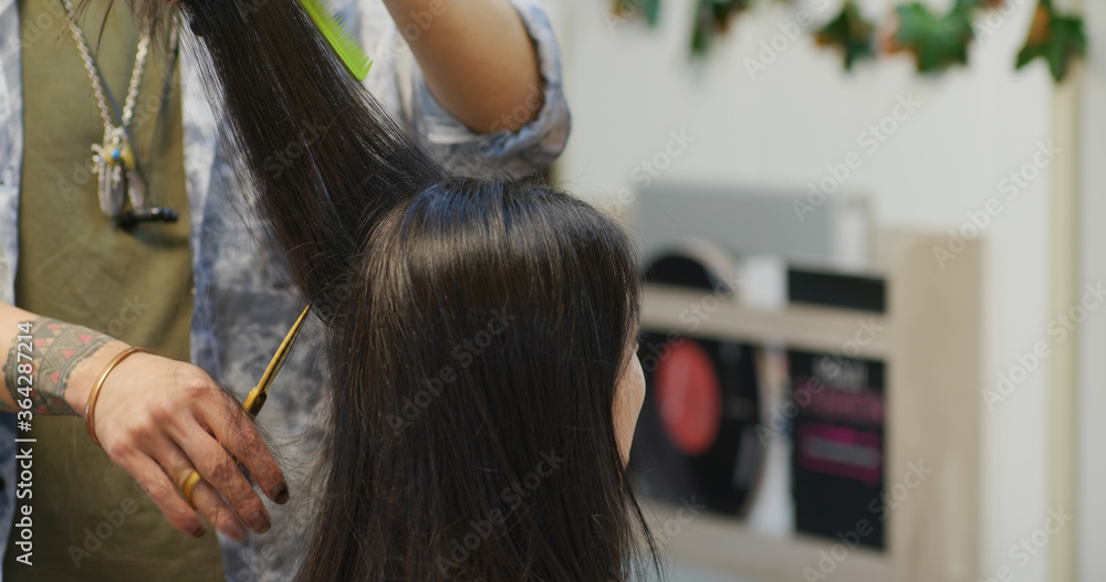 Fototapeta premium Woman hair cut in beauty salon