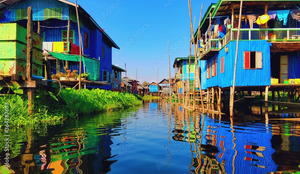 Houses built on a lake held up by bamboo. Inle Lake Myanmar