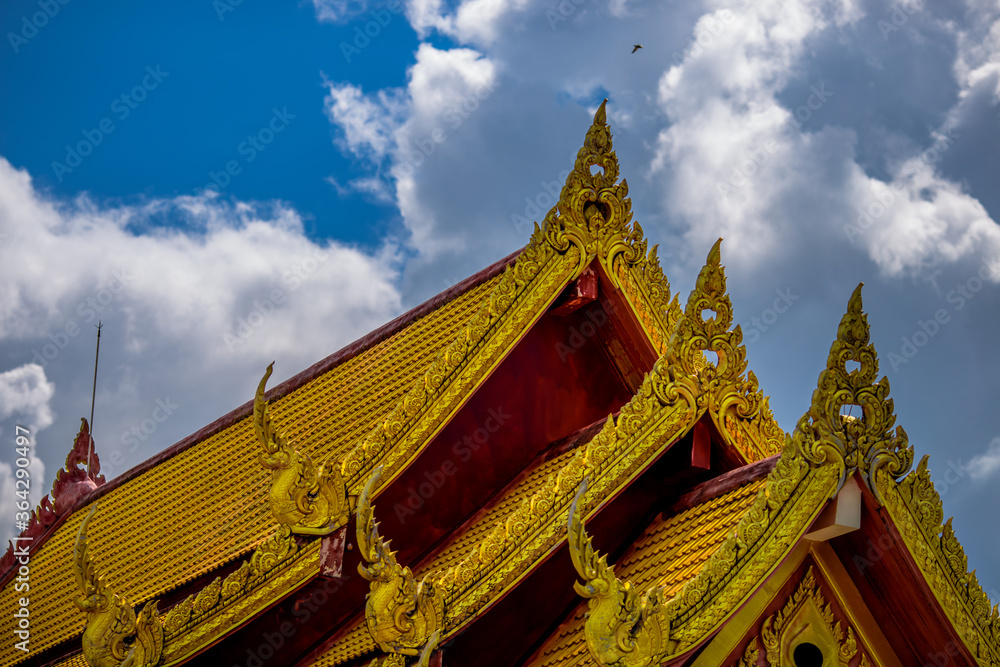 Blurred abstract background of sculptures seen at temples or religious tourist sites (Phaya Nak, Buddha statues) within Wat Pa Phu Kon in Udon Thani, Thailand Blurred abstract background of sculptures seen at temples or religious tourist sites (Phaya Nak, Buddha statues) within Wat Pa Phu Kon in Udon Thani, Thailand