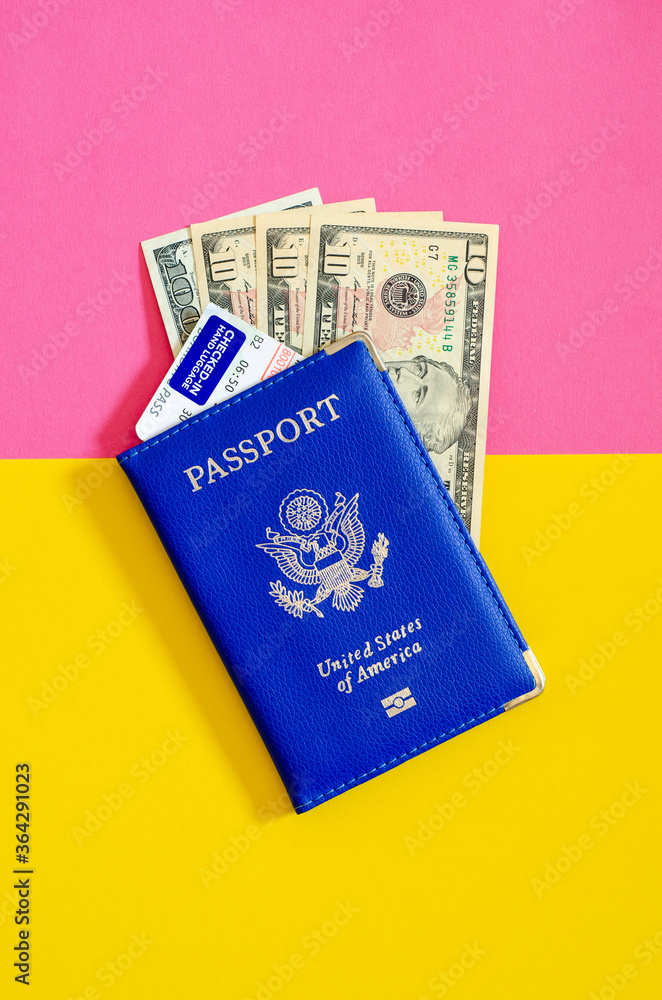 United States passport with us dollars and airplane ticket, tourism concept. United States passport with us dollars and airplane ticket, tourism concept.
