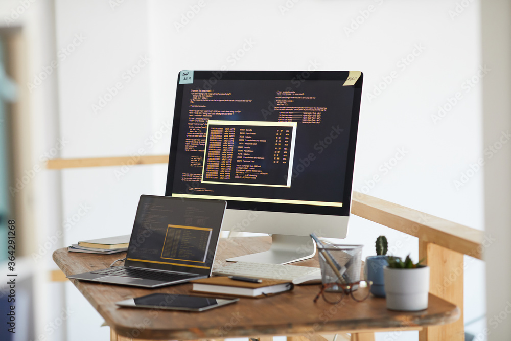Background image of black and orange programming code on computer ...