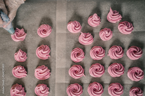 The process of making zephyr marshmallow at pastry shop kitchen.