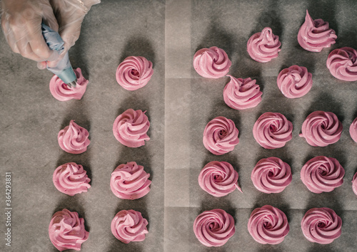 The process of making zephyr marshmallow at pastry shop kitchen.