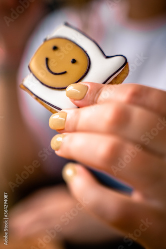 Smiley cookies in the hands