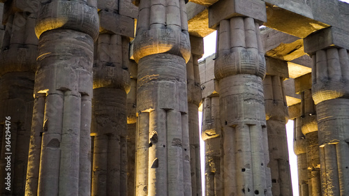 Karnak temple of Luxor architecture column detail close-up wiht uplight in evening photo