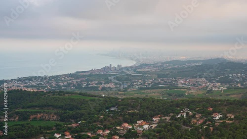 Time-lapse of the sunset on the Barcelona el Maresme coast. We can see the exit motorway to the north of Barcelona. And the towns of Alella, Masnou, Montgat, Badalona and in the background Barcelona.  photo