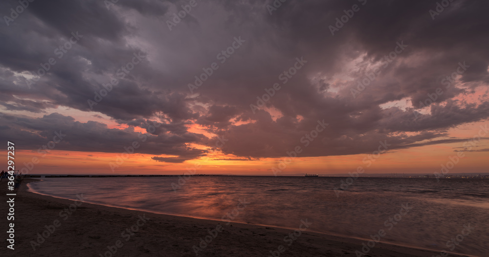 Sunrise over the sea and beautiful cloudscape Sunrise over the sea and beautiful cloudscape