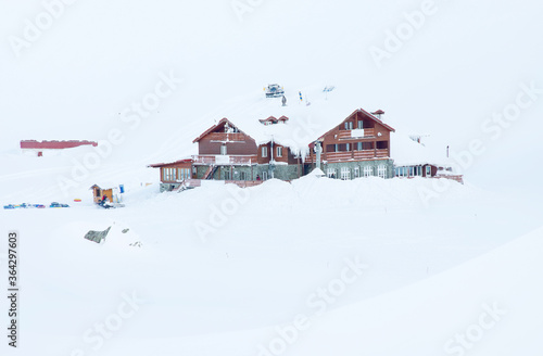 Chalet covered with snow in the Transylvanian Alps, Balea Valley, Romania, Europe © Rechitan Sorin