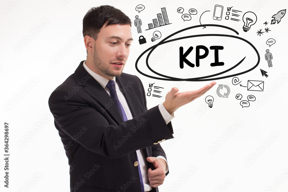 Business, technology, internet and network concept. Young businessman thinks over the steps for successful growth: KPI Business, technology, internet and network concept. Young businessman thinks over the steps for successful growth: KPI