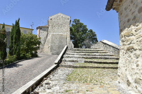 A narrow street between the houses of Cairano, a medieval town in the province of Avellino, Italy.