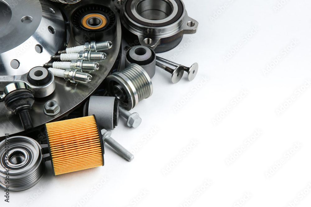 modern car parts on white background with copy space. pattern of set of auto spare parts with copy space modern car parts on white background with copy space. pattern of set of auto spare parts with copy space