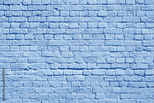 Blue brick wall. Loft interior design. Blue paint of facade.