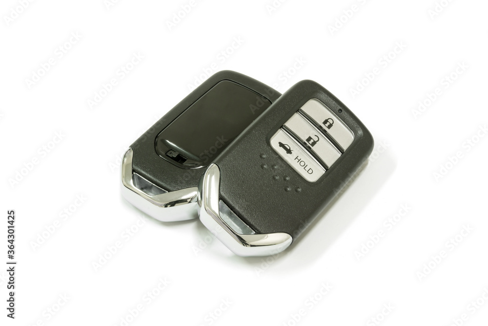 New car wave key with remote control on white background, isolated. New car wave key with remote control on white background, isolated.