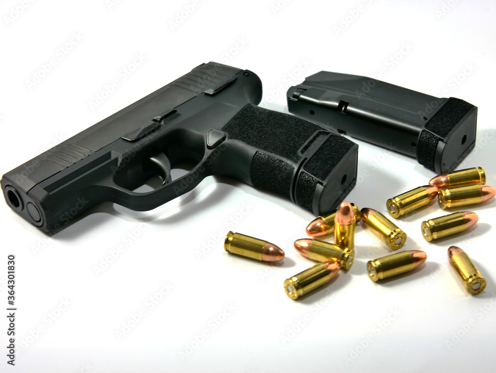 Short guns and ammunition placed on white background.Guns and ammunition are ready to use.