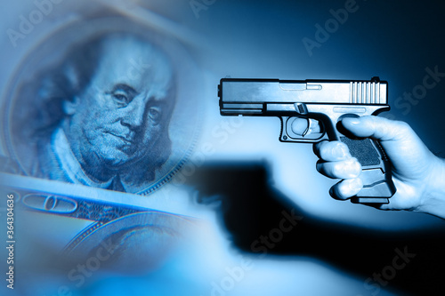 Man with a gun on the backg...