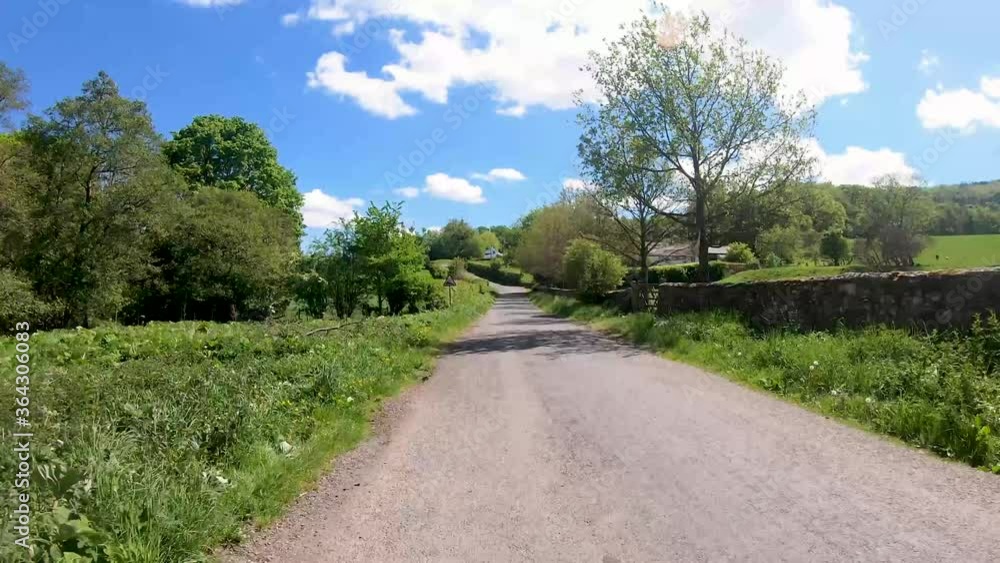 Timelapse whille cycling through a small village and country road. Timelapse whille cycling through a small village and country road.