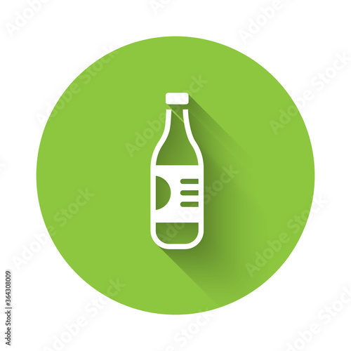 White Bottle of water icon isolated with long shadow. Soda aqua drink sign. Green circle button. Vector.