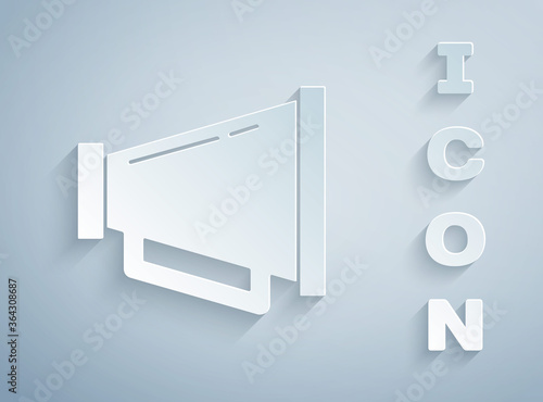 Paper cut Megaphone icon isolated on grey background. Speaker sign. Paper art style. Vector.