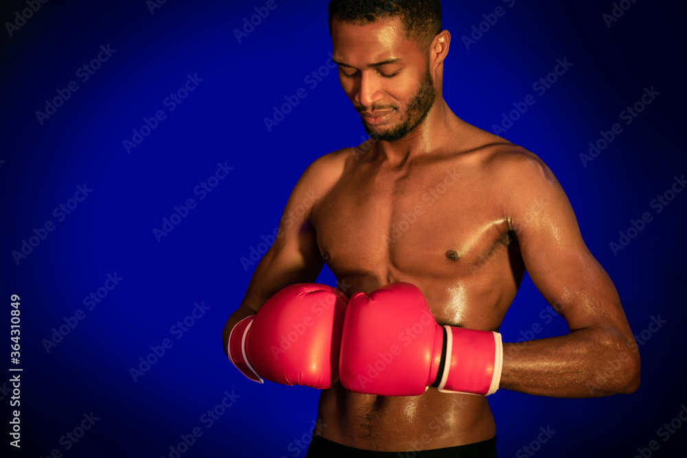 African American Boxer Man Wearing Boxing Gloves Standing In Studio African American Boxer Man Wearing Boxing Gloves Standing In Studio