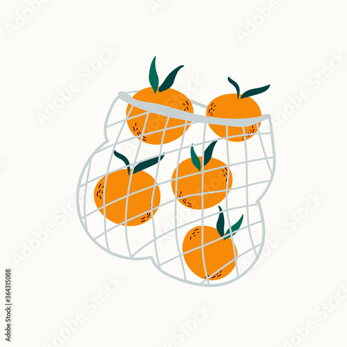 Juicy mandarins in reusable mesh shopping bag.