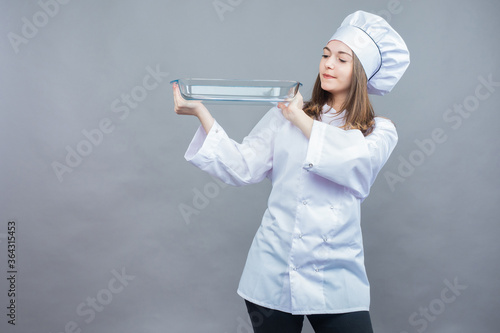 A young woman works as a Ba...