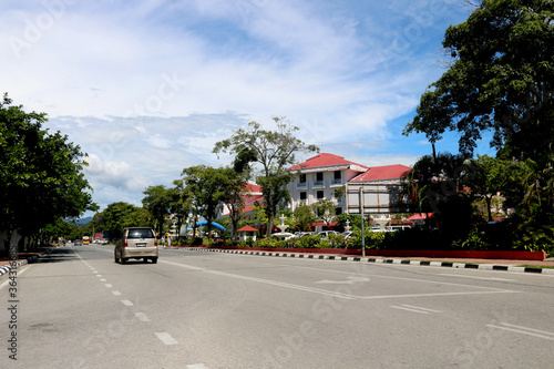 view of city at langakawi with road, car building, trees and beautiful nature