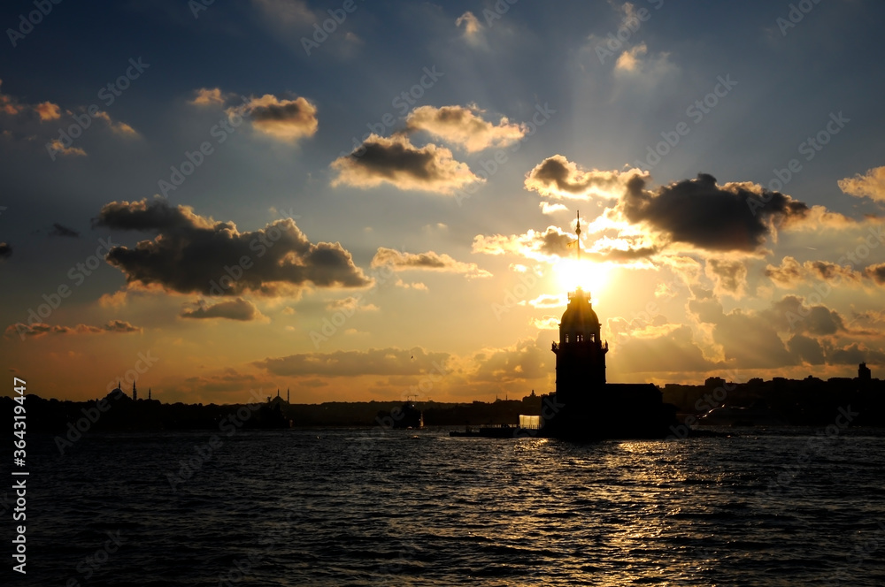 Maiden's Tower with sunset sky in Istanbul, Turkey. Maiden's tower, the symbol of Istanbul. Maiden's Tower with sunset sky in Istanbul, Turkey. Maiden's tower, the symbol of Istanbul.