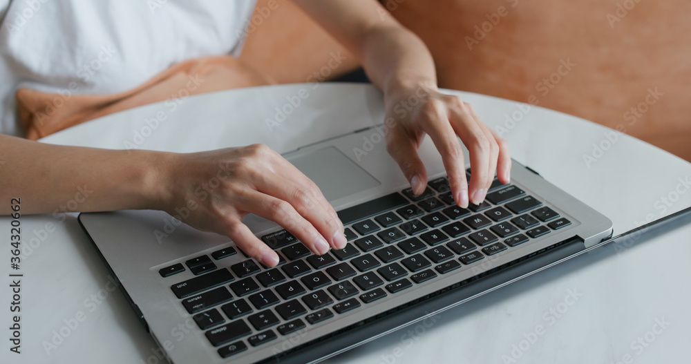 Woman work on laptop computer at home Woman work on laptop computer at home