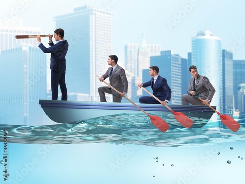 Team of businessmen in teamwork concept with boat © Elnur