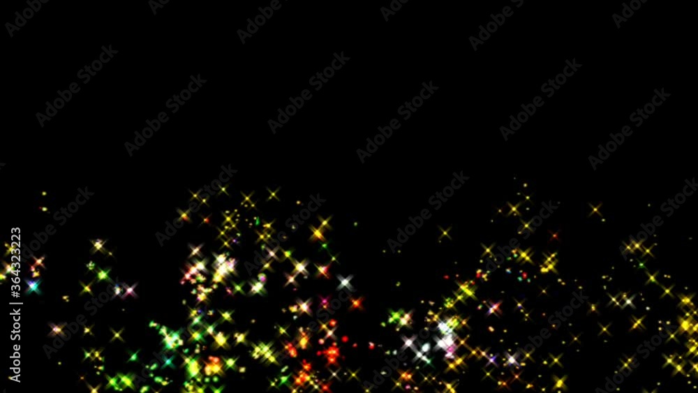 Gold particles mixed with luminous colorful dust, scattered on a black background, can be used to edit your video content Gold particles mixed with luminous colorful dust, scattered on a black background, can be used to edit your video content