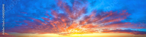 landscape with sky, clouds and sunrise a panoramic view