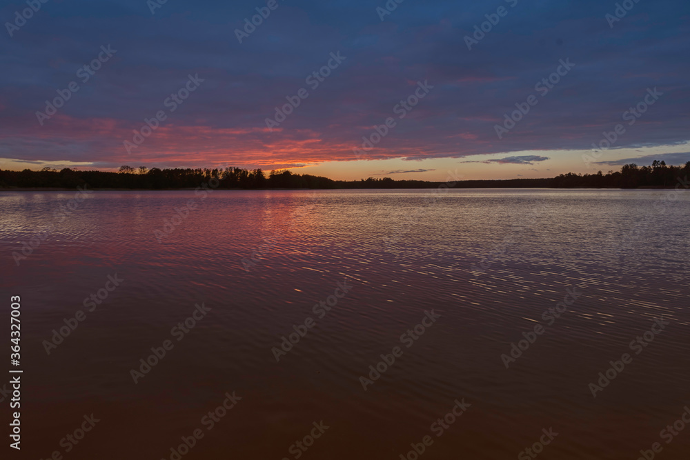 Beautiful sunset on the lake. Polish lakes