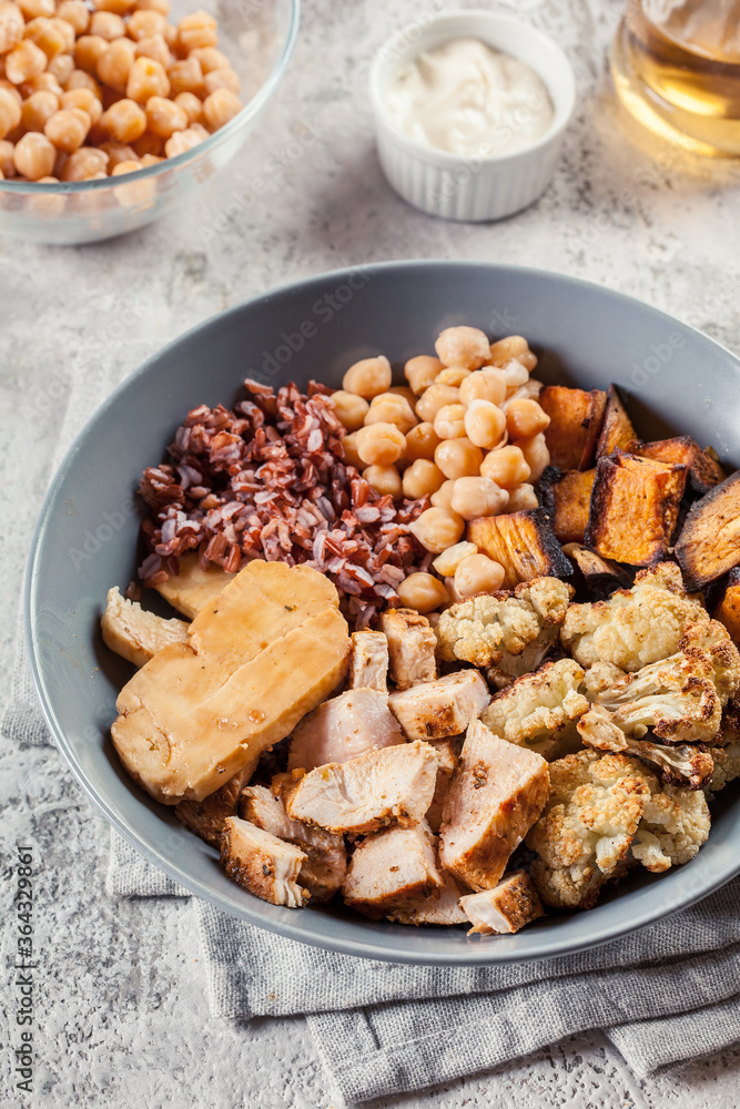 Fototapeta premium Buddha bowl lunch with chicken and other